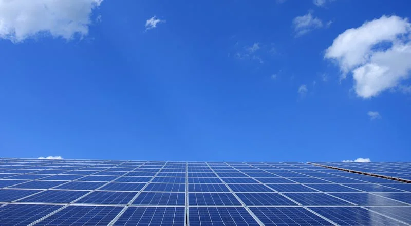 Neglected dusty solar panels on a roof